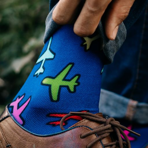 Aeroplane Sox with brown shoes and jeans.